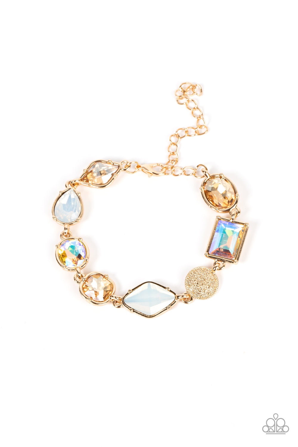 Paparazzi Accessories Jewelry Box Bauble - Gold Encased in pronged gold fittings, a mismatched collection of golden, iridescent, and opal rhinestones delicately links with a studded gold frame around the wrist for a sentimental sparkle. Features an adjust
