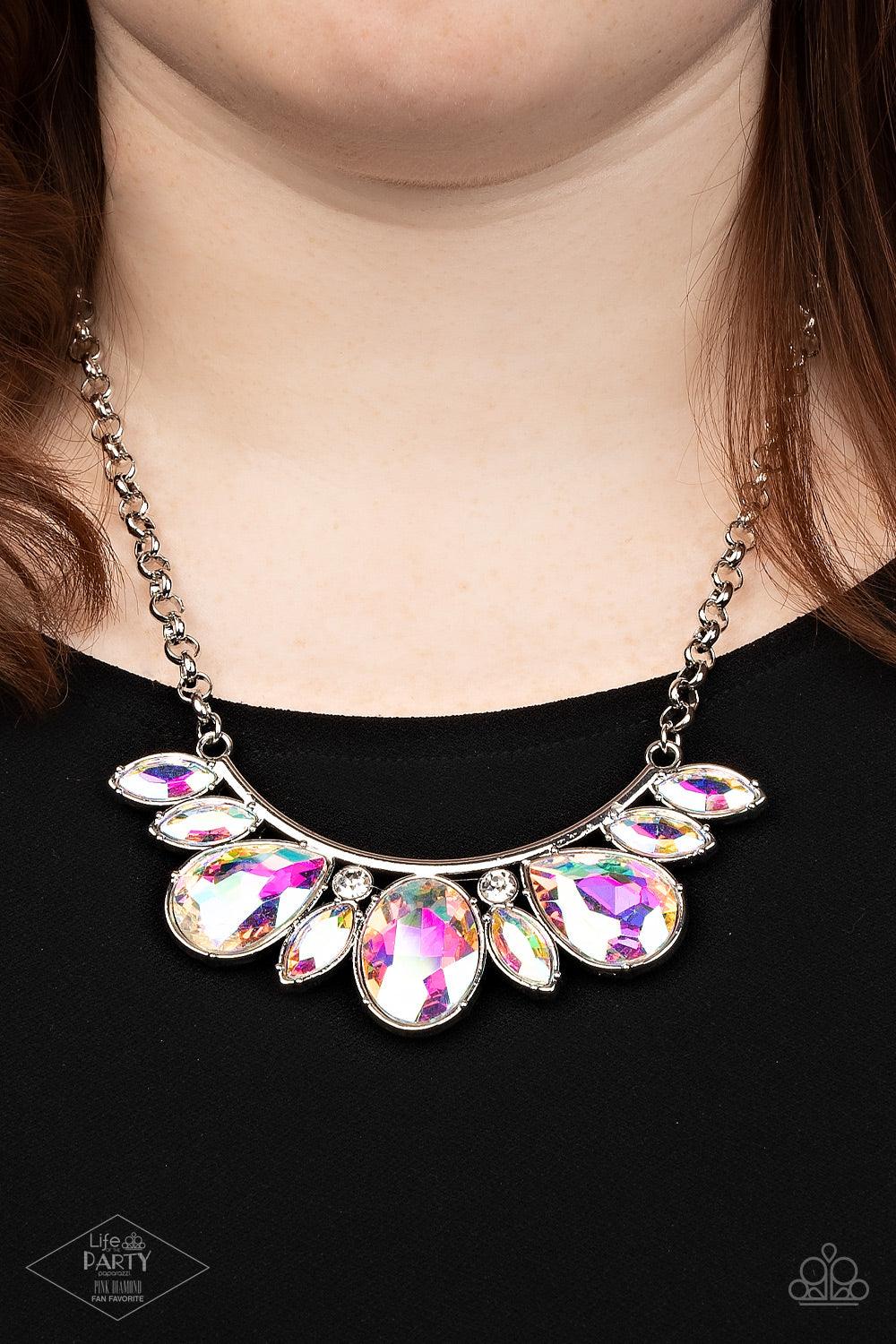 Paparazzi Accessories Never SLAY Never - Multi Infused with a pair of glassy white rhinestones, an oversized collection of marquise and teardrop iridescent rhinestones drips from the bottom of a bowing silver bar, coalescing into a sassy statement piece b