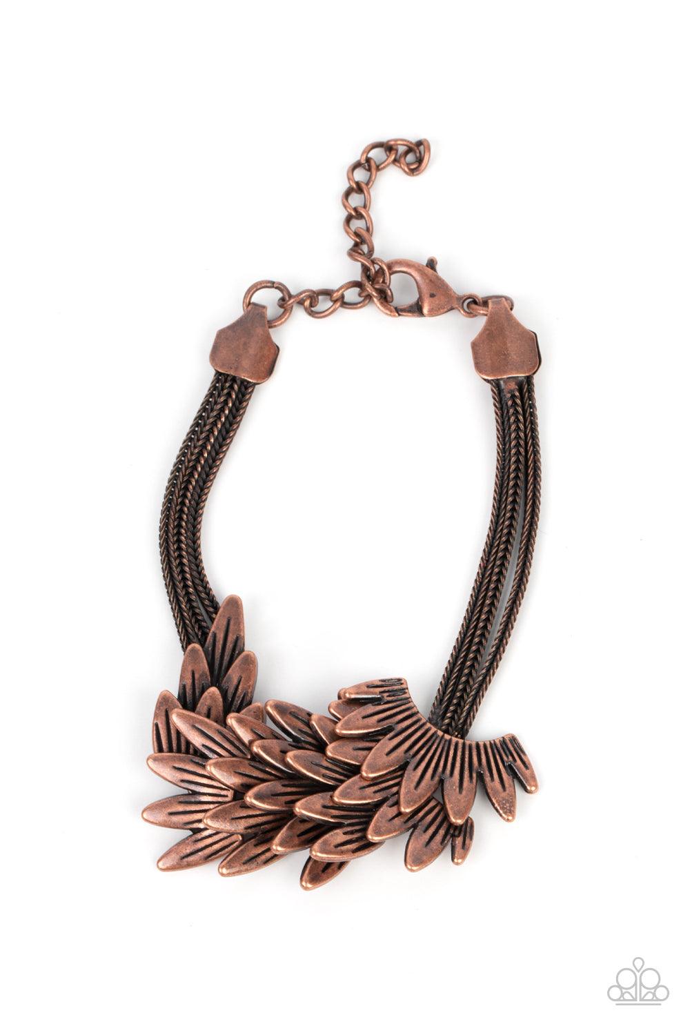 Paparazzi Accessories BOA and Arrow - Copper Feathery copper frames delicately overlap across the center of the wrist, creating a boa-like centerpiece atop rows of rustic copper chains. Features an adjustable clasp closure. Sold as one individual bracelet