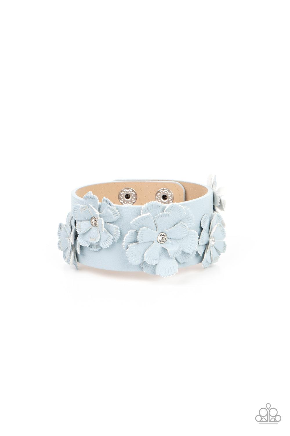 Paparazzi Accessories What Do You Pro-POSIES - Blue Dotted with dainty white rhinestone centers, textured Glacier Lake leather petals layer into a blooming floral centerpiece atop the front of a thick Glacier Lake leather band for a rustic finish. Feature