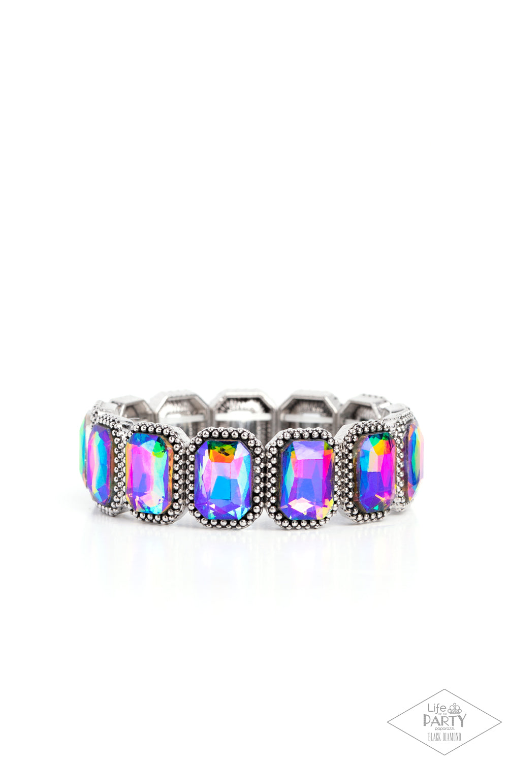 Paparazzi Accessories Studded Smolder - Multi Oversized emerald style oil spill gems are encased in antiqued studded frames that are threaded along stretchy bands around the wrist, creating a smoldering centerpiece. Due to its prismatic palette, color may