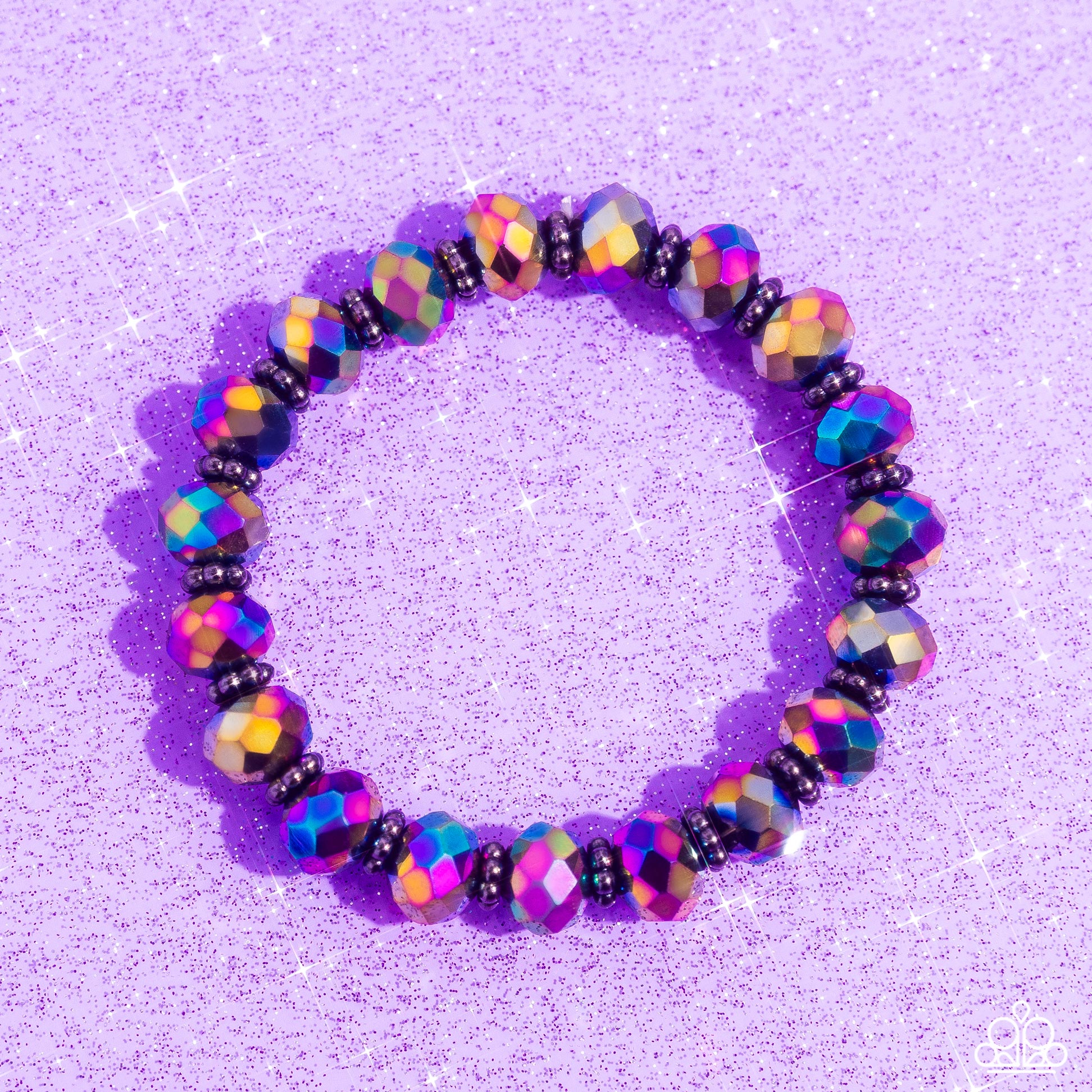 Paparazzi Accessories Shimmering Satisfaction - Multi Dipped in metallic shimmer, glittery oil spill crystal-like beads and studded gunmetal rings are threaded along a stretchy band around the wrist for a stellar fashion. Sold as one individual bracelet.