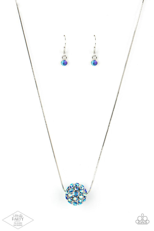 Paparazzi Accessories Come Out of Your BOMBSHELL - Multi Bedazzled in stellar iridescent rhinestones, a dramatic silver bead slides along a sleek silver chain below the collar for a statement-making look. Due to its prismatic palette, color may vary. Feat