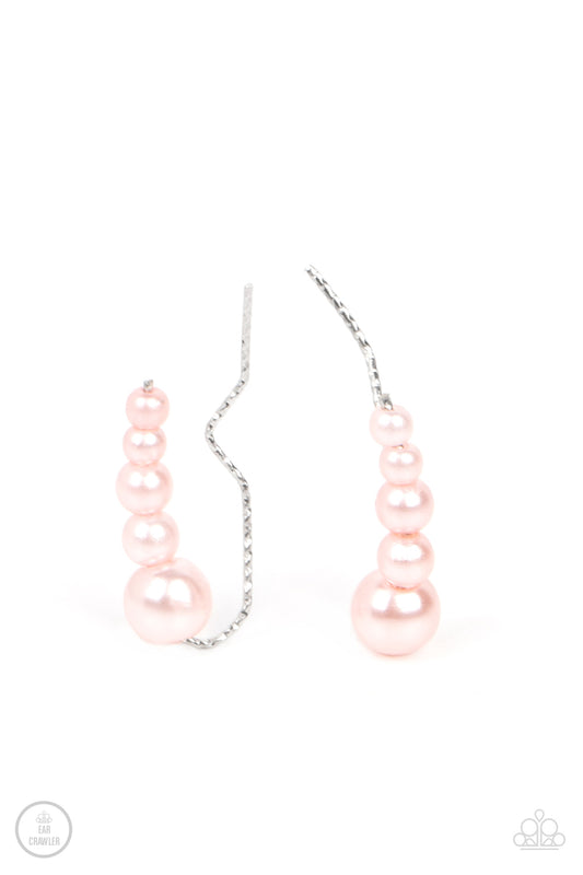 Paparazzi Accessories Dropping into Divine - Pink A bubbly cluster of dainty pink pearls decrease in size as they climb the ear, curving into an effervescent accent. Features an extended post fitting that climbs the back of the ear and can be pressed toge