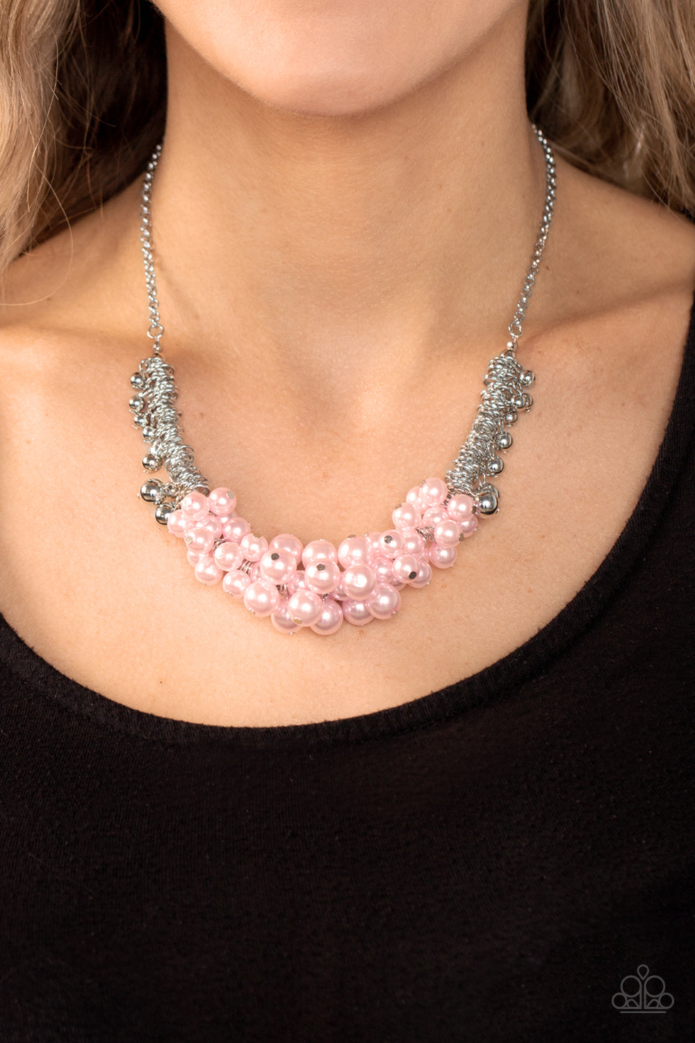 Paparazzi Accessories Bonus Points - Pink A bubbly cluster of Gossamer Pink pearls are bunched together between hanging silver beads that dangle between jampacked rows of silver rings, resulting in exaggerated effervescence below the collar. Features an a