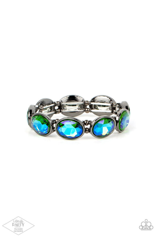 Paparazzi Accessories Diva In Disguise - Multi 3 Blue oil spill gems are pressed into sleek gunmetal frames. Infused with dainty gunmetal beads, the sparkly frames are threaded along stretchy bands for a glamorous look around the wrist. Sold as one indivi