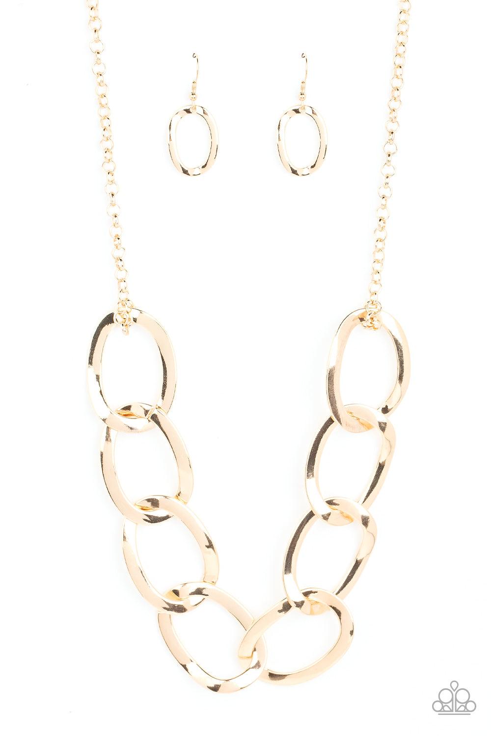 Paparazzi Accessories I've got the Power - Gold Attached to a classic gold chain, an oversized collection of warped oval links boldly interlocks below the collar for an intense industrial look. Features an adjustable clasp closure. Sold as one individual