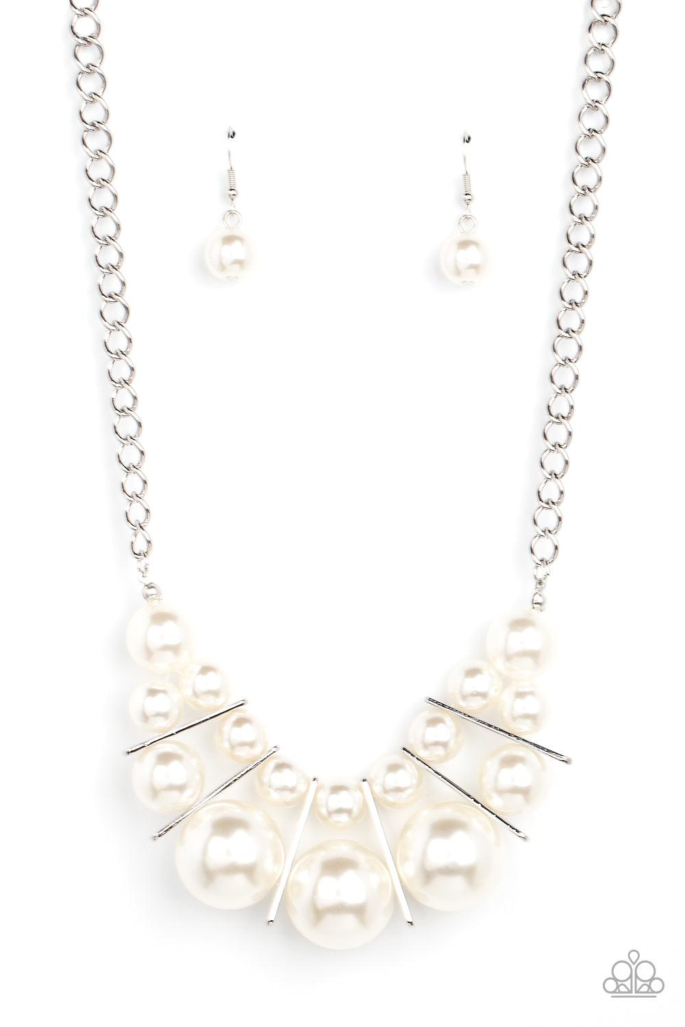 Paparazzi Accessories Challenge Accepted - White Separated by rectangular silver frames, bubbly rows of classic and oversized white pearls are threaded along invisible wires at the bottom of a chunky silver chain for an effervescent explosion below the co