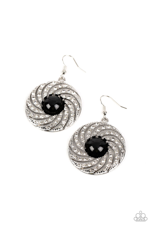Paparazzi Accessories Vintage Vortex - Black Dotted in dainty silver studs, ribbons of white rhinestones whirl around an oversized black bead center for a hypnotic twinkle. Earring attaches to a standard fishhook fitting. Sold as one pair of earrings. Jew