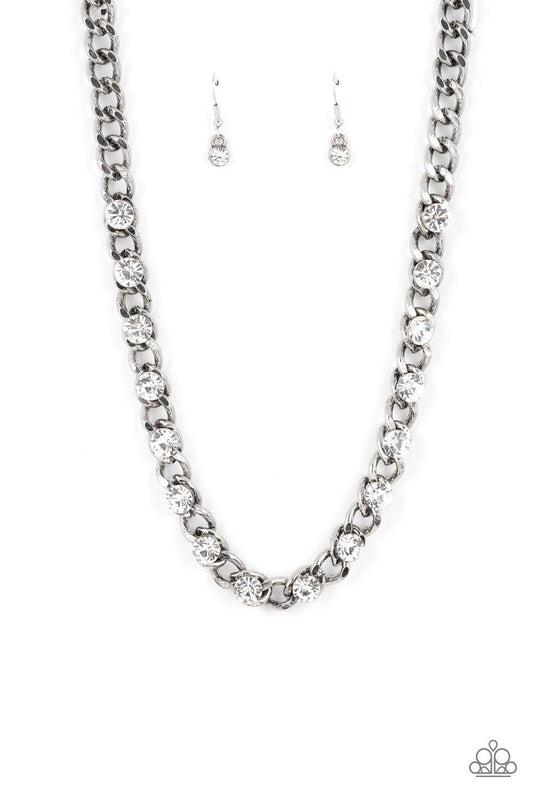 Paparazzi Accessories Major Moxie - White Oversized white rhinestones dot a row of oversized silver chain, resulting in a gritty glitz below the collar. Features an adjustable clasp closure. Sold as one individual necklace. Includes one pair of matching e