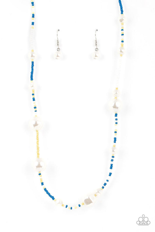 Paparazzi Accessories Modern Marina - Blue Irregular-shaped pearls in varying sizes are scattered amongst blue, yellow, and white seed beads that are threaded along a wire, resulting in a refreshing and playful style below the collar. Sold as one individu
