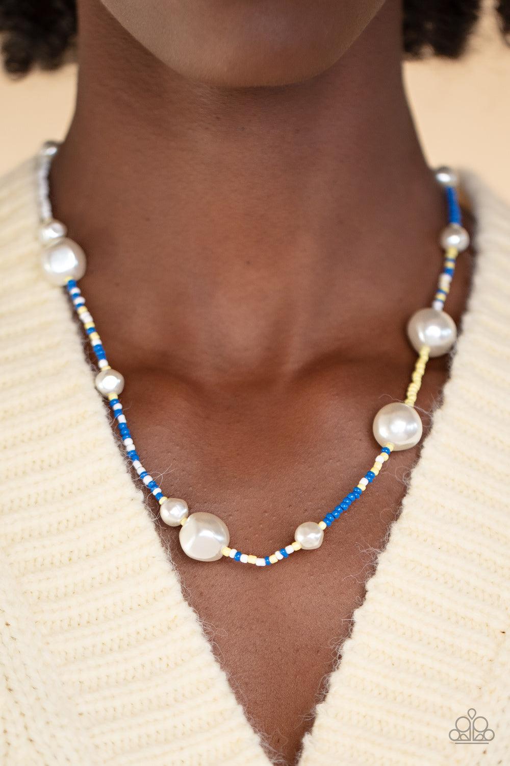 Paparazzi Accessories Modern Marina - Blue Irregular-shaped pearls in varying sizes are scattered amongst blue, yellow, and white seed beads that are threaded along a wire, resulting in a refreshing and playful style below the collar. Sold as one individu