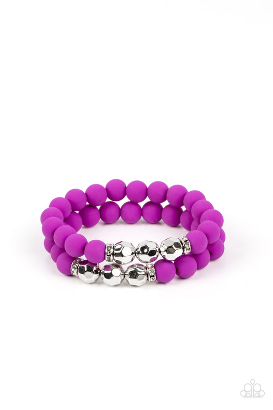Paparazzi Accessories Dip and Dive - Purple White rhinestone encrusted rings flank a trio of faceted silver beads along a stretchy row of matte-finished Dahlia beads, creating a summery splash of color around the wrist. Sold as one pair of bracelets. Get