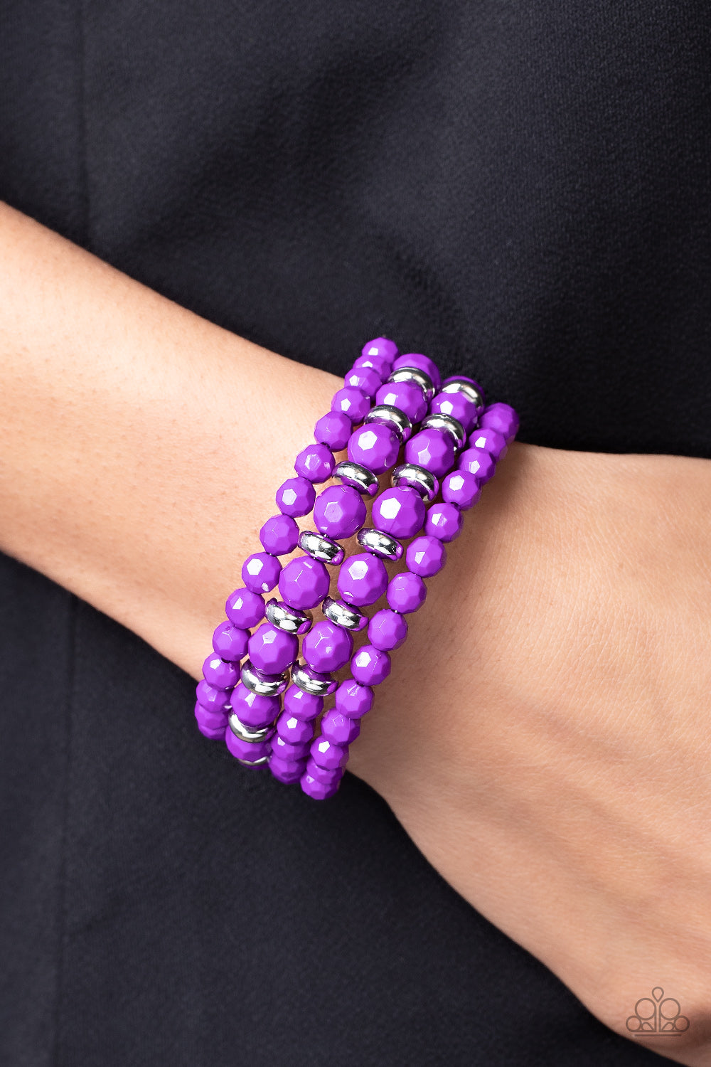 Paparazzi Accessories Its a Vibe - Purple Accented with silver discs, a mismatched assortment of faceted Dahlia beads are threaded along a wire that coils around the wrist, creating a vivacious infinity wrap bracelet. Sold as one individual bracelet. Brac