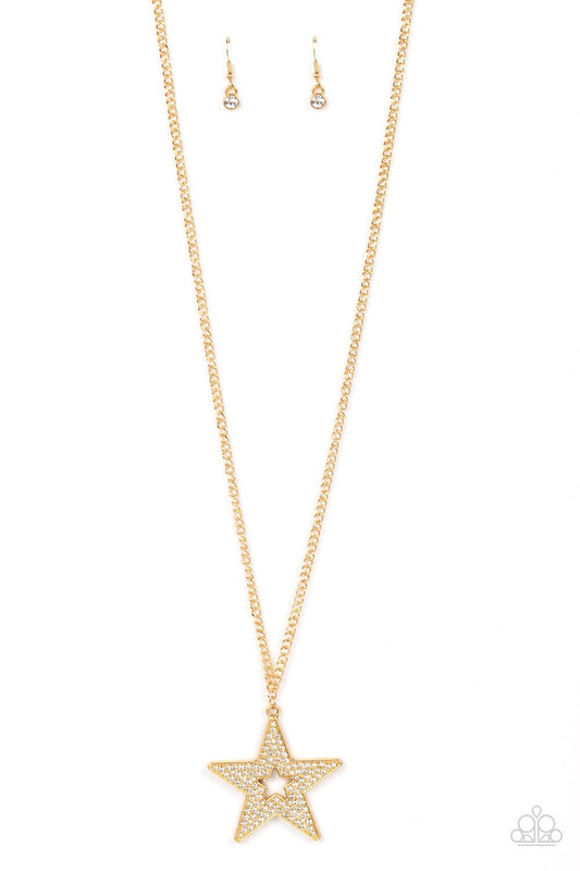 Paparazzi Accessories Superstar Stylist - Gold Blinding white rhinestones are encrusted across the front of an oversized gold star frame at the bottom of a lengthened gold chain, resulting in a stellar sparkle. Features an adjustable clasp closure. Sold a