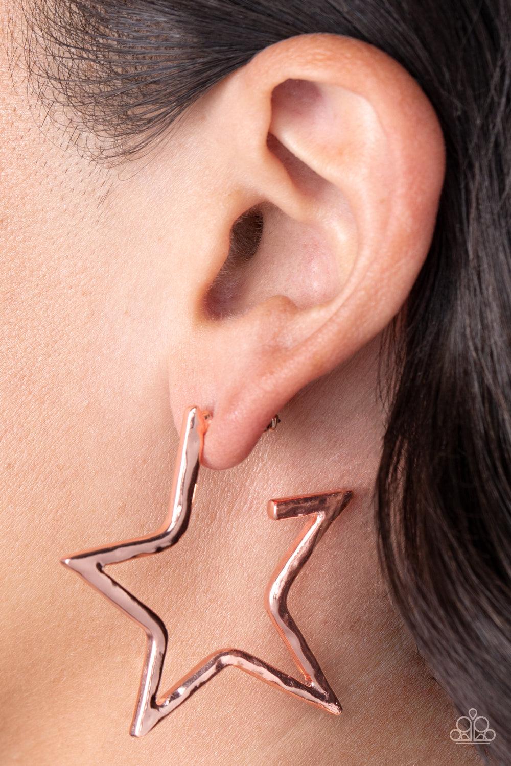 Paparazzi Accessories All-Star Attitude - Copper A hammered shiny copper bar delicately folds into a star-shaped hoop, resulting in a stellar metallic shimmer. Earring attaches to a standard post fitting. Sold as one pair of hoop earrings. Earrings