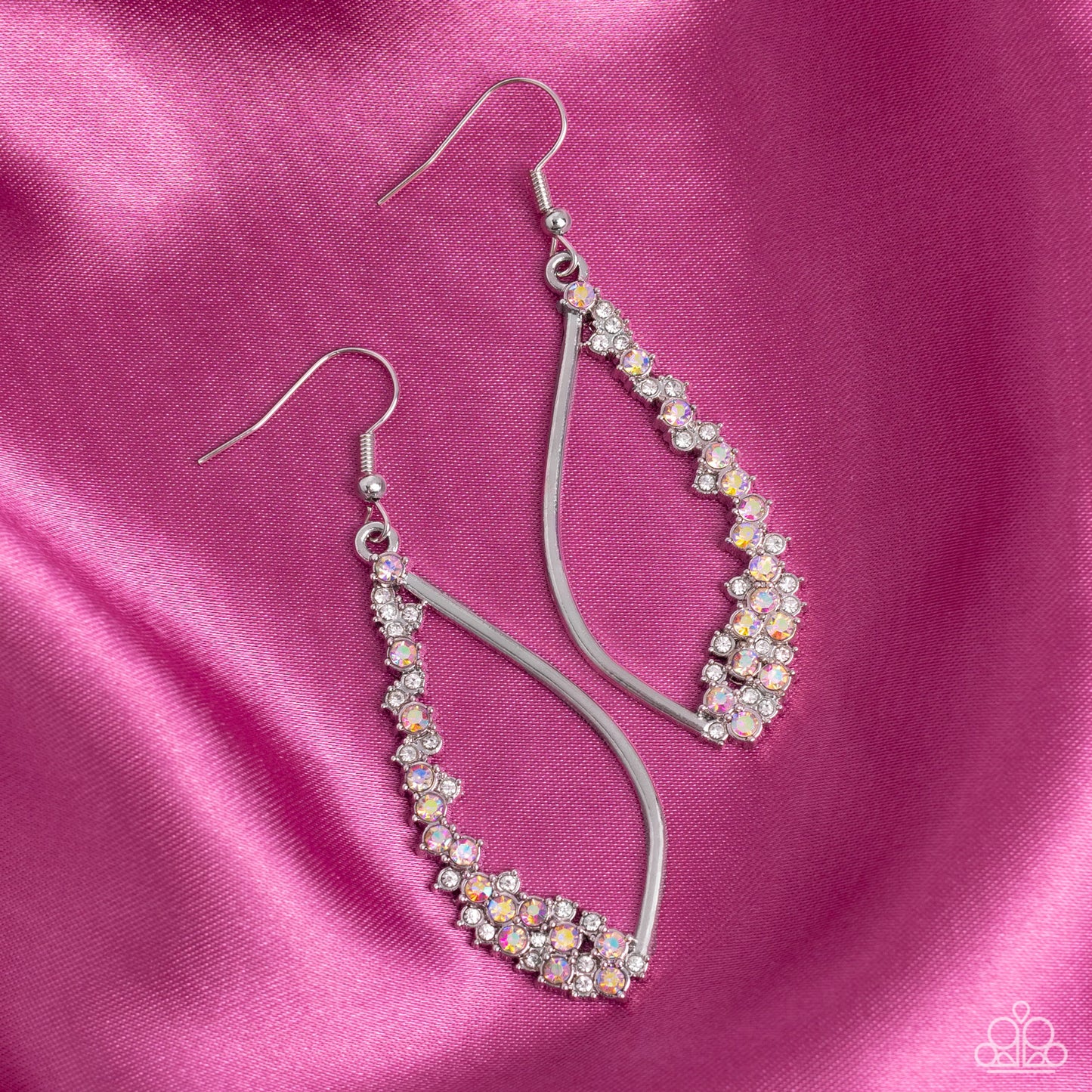 Paparazzi Accessories Sparkly Side Effects - Multi Set in silver pronged fittings, dainty white and iridescent rhinestones tumble down one side of an airy silver lure for a bubbly blast of sparkle. Earring attaches to a standard fishhook fitting. Due to i