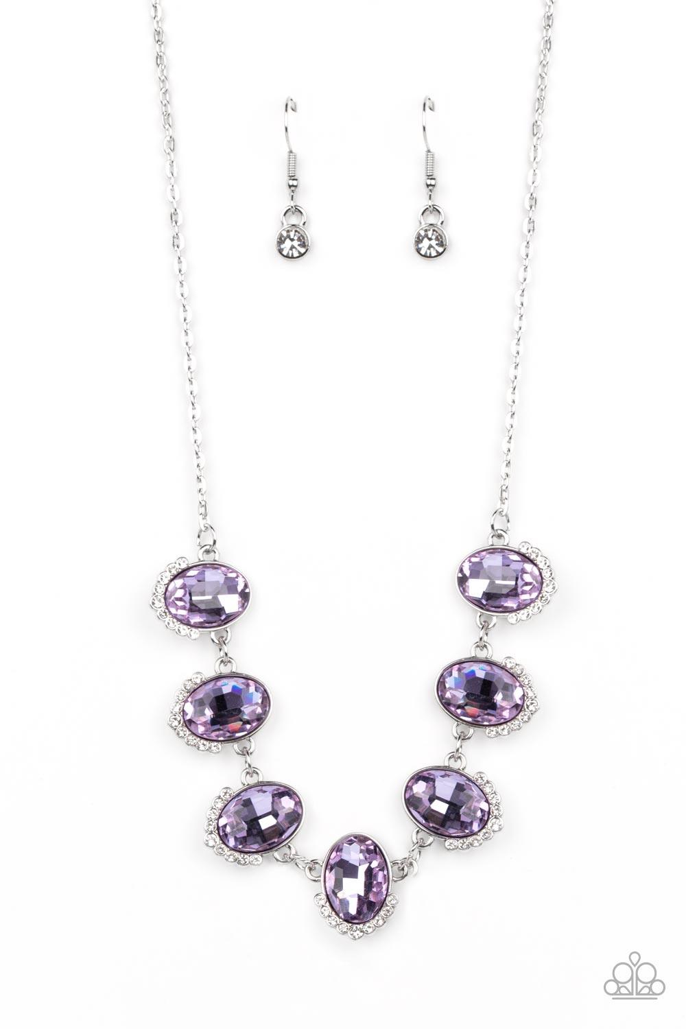 Paparazzi Accessories Unleash Your Sparkle - Purple Dainty rows of glittery white rhinestones gently curve around the bottoms of oversized Very Peri oval gems. The sparkly frames delicately connect below the collar, creating a colorful centerpiece. Featur