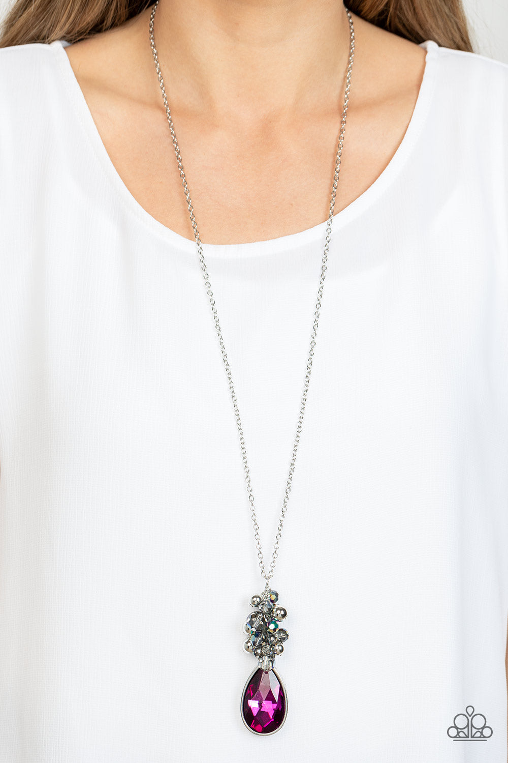 Paparazzi Accessories Colorful Convergence - Multi A dramatically oversized teardrop gem sparkles at the bottom of a cluster of silver beads, smoky crystal-like beads, and metallic oil spill accents. The effervescent pendant swings from the bottom of a le
