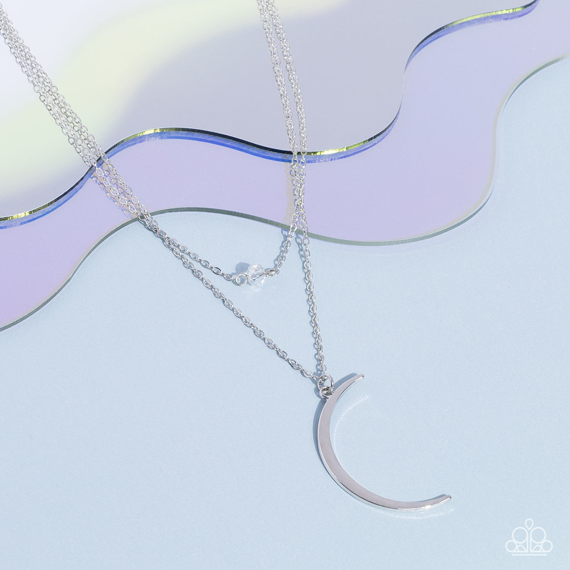 Paparazzi Accessories Modern Moonbeam - White Two dainty silver chains delicately layer below the collar. A white crystal-like bead sparkles at the center of the uppermost chain while a silver half moon pendant swings from the bottom of the display for a