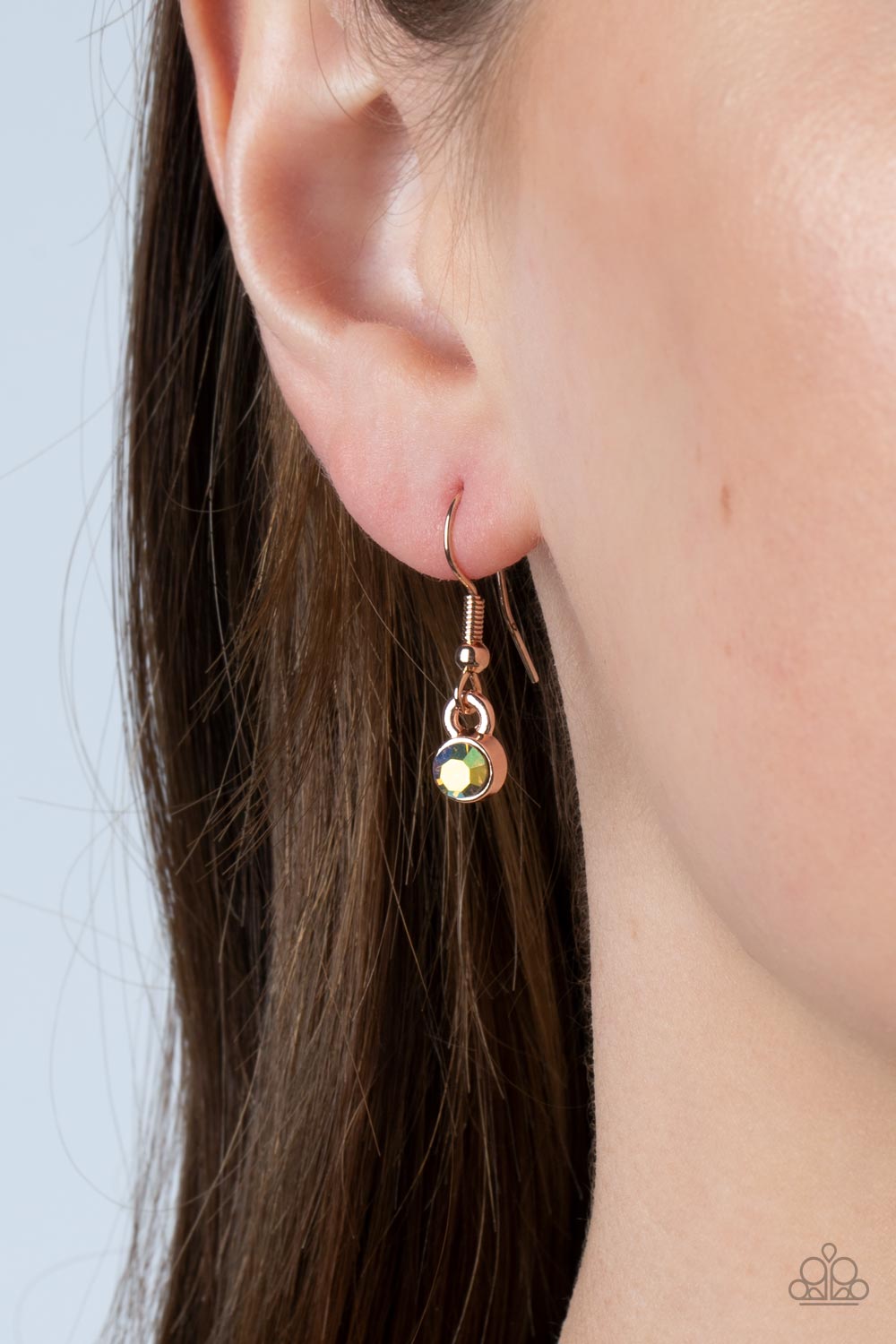 Paparazzi Accessories Cosmic Cosmos - Multi Airy rose gold petals delicately bloom inside twisted rose gold hoops below the collar. Dotted with iridescent rhinestone centers, the flowery frames gradually increase in size as they link with twisted rose gol
