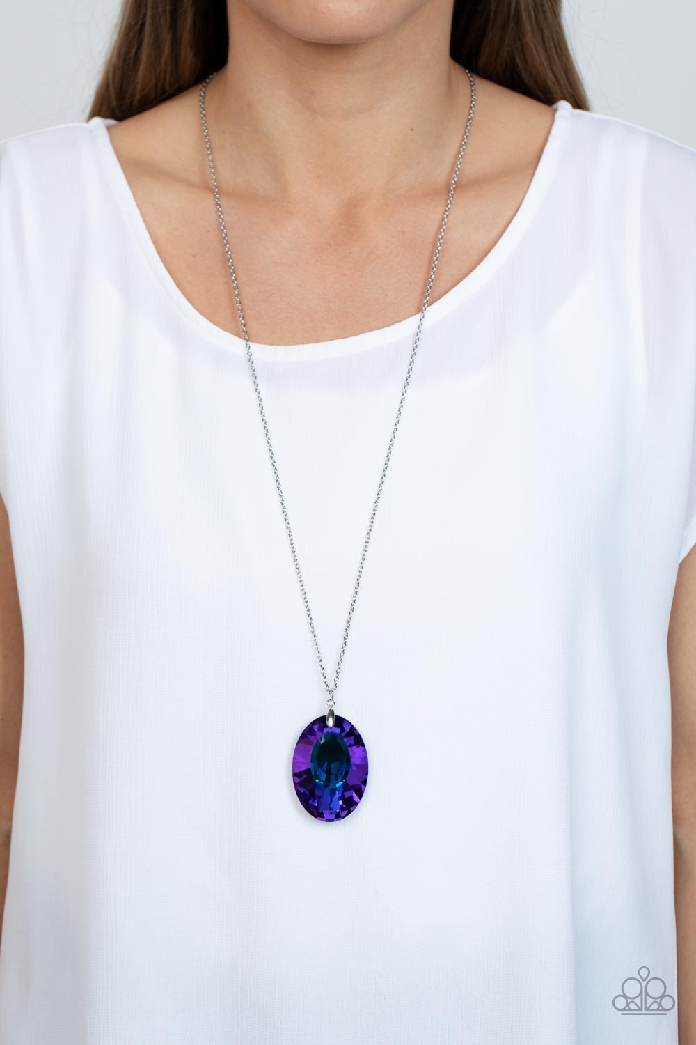 Paparazzi Accessories Celestial Essence - Blue Featuring a blue reflective focal point and an exaggerated faceted surface, a dramatically oversized, blue iridescent gem sparkles at the bottom of a lengthened silver chain for an out-of-this-world kind of d