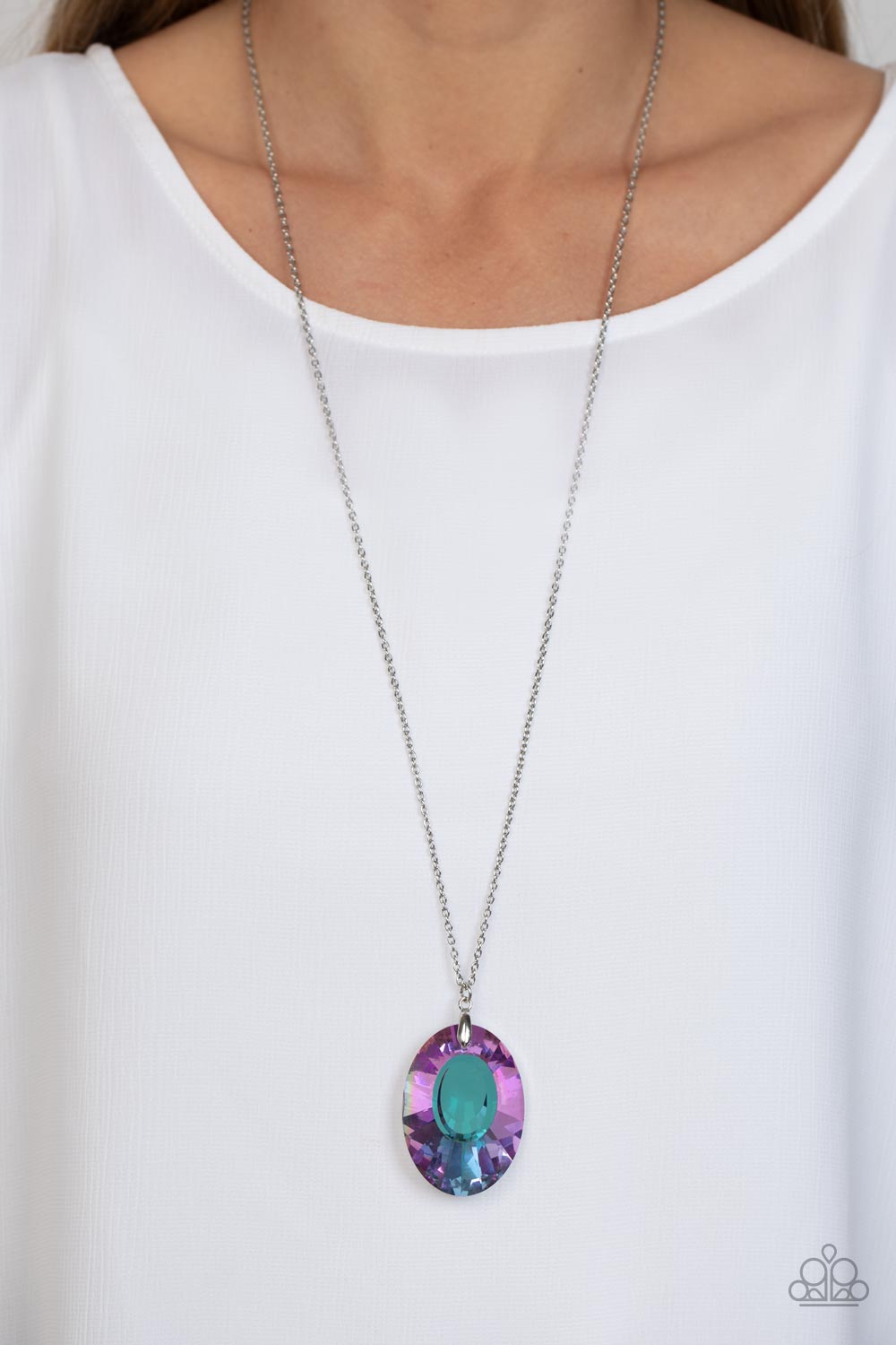 Paparazzi Accessories Celestial Essence - Purple Featuring a blue reflective focal point and an exaggerated faceted surface, a dramatically oversized, purple iridescent gem sparkles at the bottom of a lengthened silver chain for an out-of-this-world kind