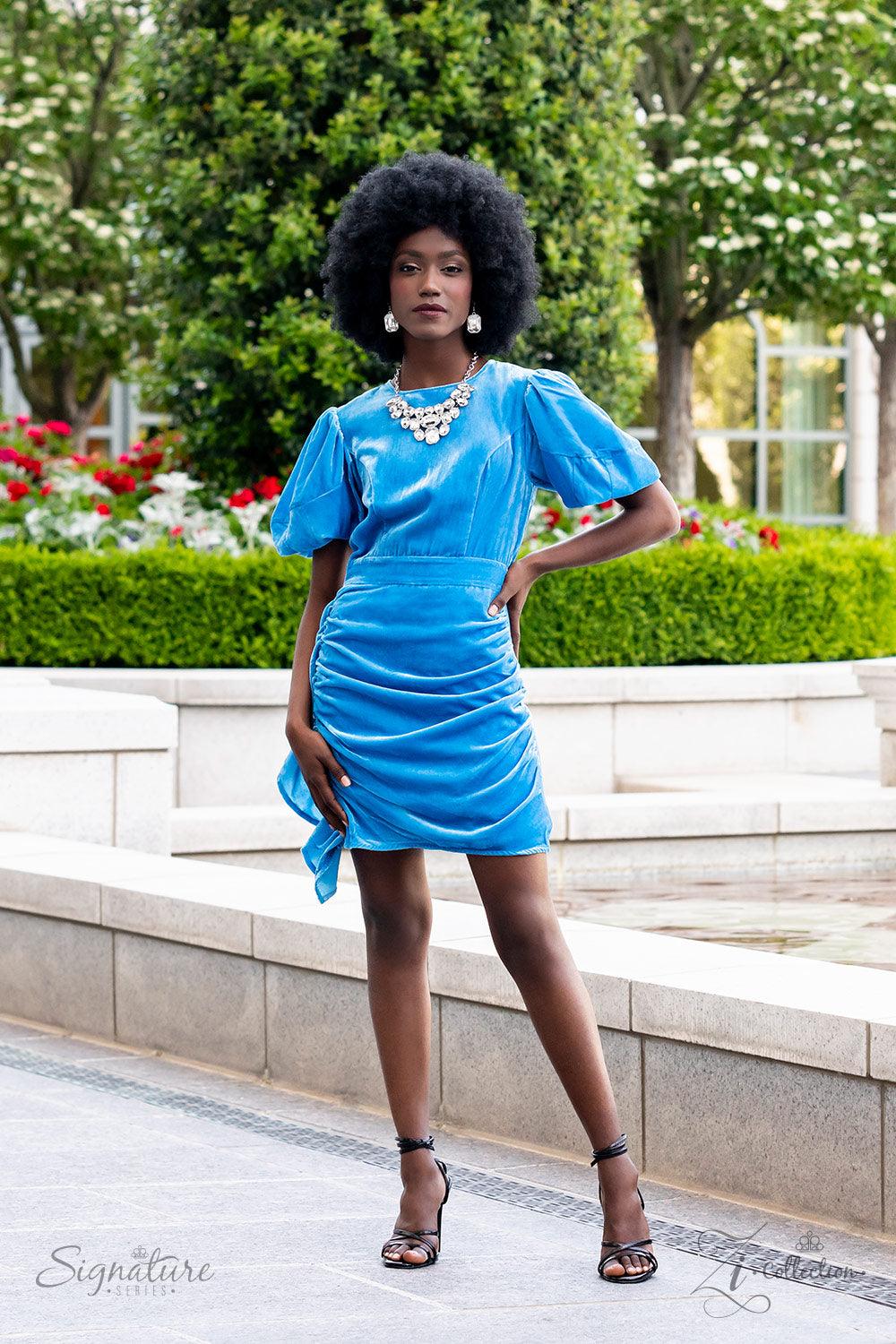 Paparazzi Accessories The Tasha Encased in pronged silver frames, a collection of oversized marquise, round, oval, emerald, and teardrop shaped white gems blindingly coalesces into a jaw-dropping statement piece below the collar. At the center of the coll