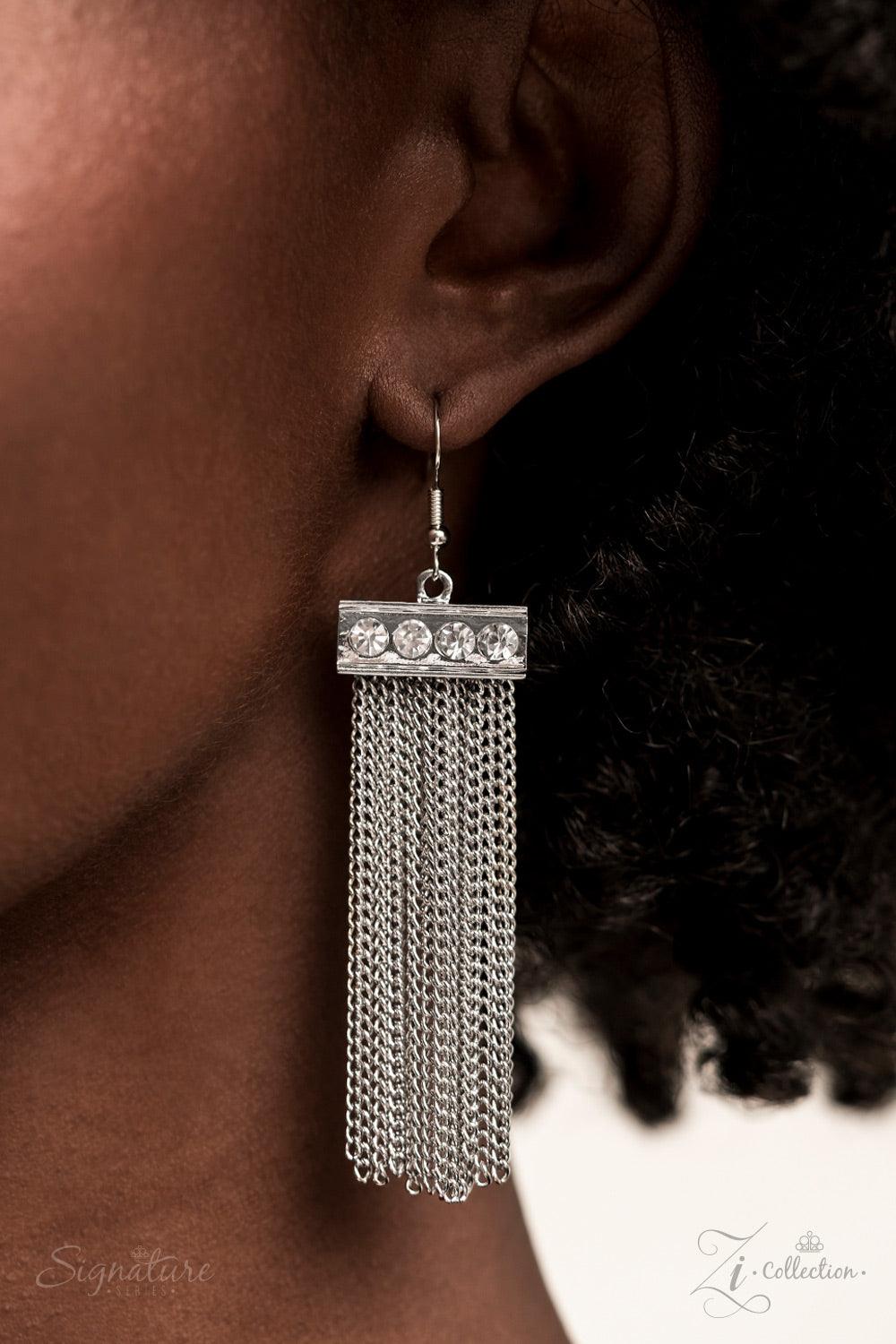 Paparazzi Accessories The Hope A dramatically oversized, smoky, Asscher cut gem sits boldly at the bottom of a thick silver chain, creating a majestic focal point. An emerald cut gem in the same smoky hue connects to the bottom of the large centerpiece, f