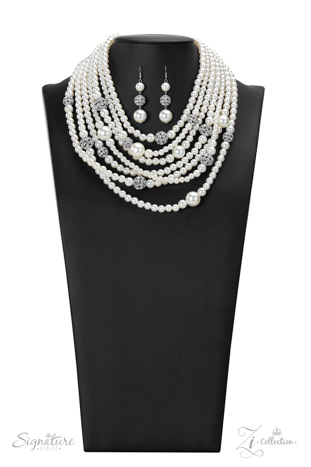 Paparazzi Accessories The Courtney Strand after strand of lustrous white pearls layer down the chest, creating timeless tiers. Airy silver spheres, adorned in sparkling white rhinestones, are effortlessly sprinkled among the sea of pearls, infusing the de