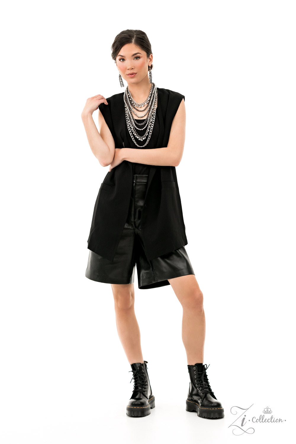 Paparazzi Accessories Audacious Featuring a range of oval and curb style links, a chaotic assortment of bulky silver and gunmetal chains fearlessly layers down the chest. Polished silver beads and textured silver discs swing from the thick curb chains, in