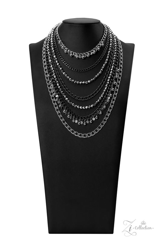 Paparazzi Accessories Audacious Featuring a range of oval and curb style links, a chaotic assortment of bulky silver and gunmetal chains fearlessly layers down the chest. Polished silver beads and textured silver discs swing from the thick curb chains, in
