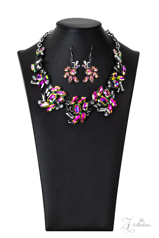 Paparazzi Accessories Obsessed Clusters of hematite and oil spill rhinestones link together along the collar, creating an explosion of futuristic sparkle. The faceted edges of each emerald-, round-, or marquise-cut gem exaggerate their dramatic angles and