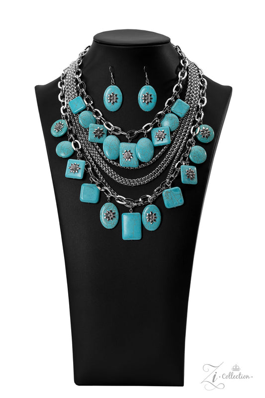 Paparazzi Accessories Bountiful Strands of oversized silver chain links and rounded box chain in the same metallic sheen, drape into dramatic layers across the chest, creating a boisterous collision of texture. Smooth turquoise stones, chiseled into large
