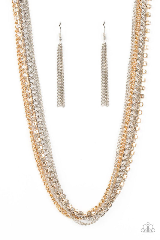 Paparazzi Accessories Free to CHAINge My Mind - Multi A mashup of gold and silver chains collides with a strand of sparkling white rhinestones encased in gold fittings. The contrast of gritty gold and silver finishes and shimmery accents creates a brillia