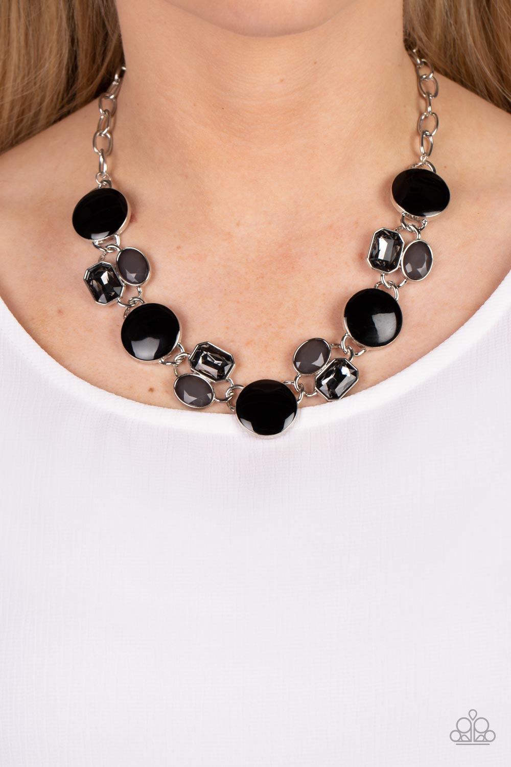 Paparazzi Accessories Dreaming in MULTICOLOR - Black Sparkling smoky gems combine with black beads and alternate across the collar with oversized discs painted in black enamel. The whimsically modern collection connects to a silver chain resulting in a ch