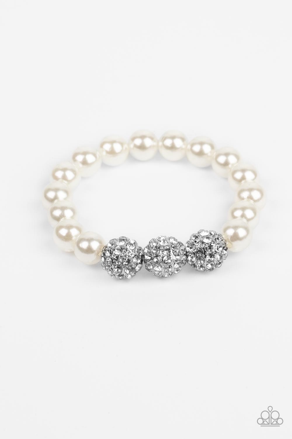 Paparazzi Accessories Breathtaking Ball - White A trio of silver beads encrusted in rhinestones is centered along a strand of classic white pearls. The beads are threaded along a stretchy band, wrapping around the wrist in a refined finish. Sold as one in