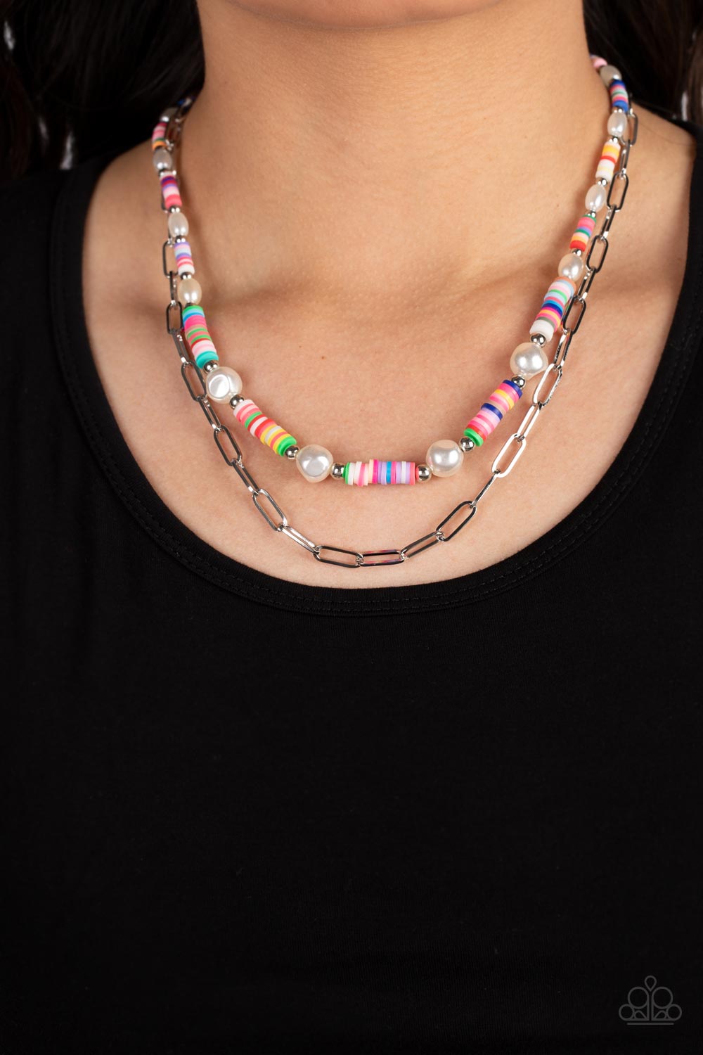 Paparazzi Accessories Tidal Trendsetter - Multi Sections of colorful rubber discs in rainbow shades are separated by tiny silver beads and a variety of white baroque pearls to create an unexpected mashup of texture along the collar. A strand of silver pap