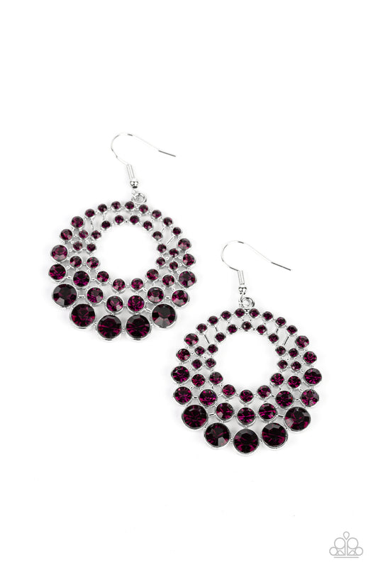 Paparazzi Accessories So Self-GLOW-rious - Purple Gradually increasing in size and intensity, row after row of glassy purple rhinestones stack into a layered hoop for a blinding effervescence. Earring attaches to a standard fishhook fitting. Sold as one p