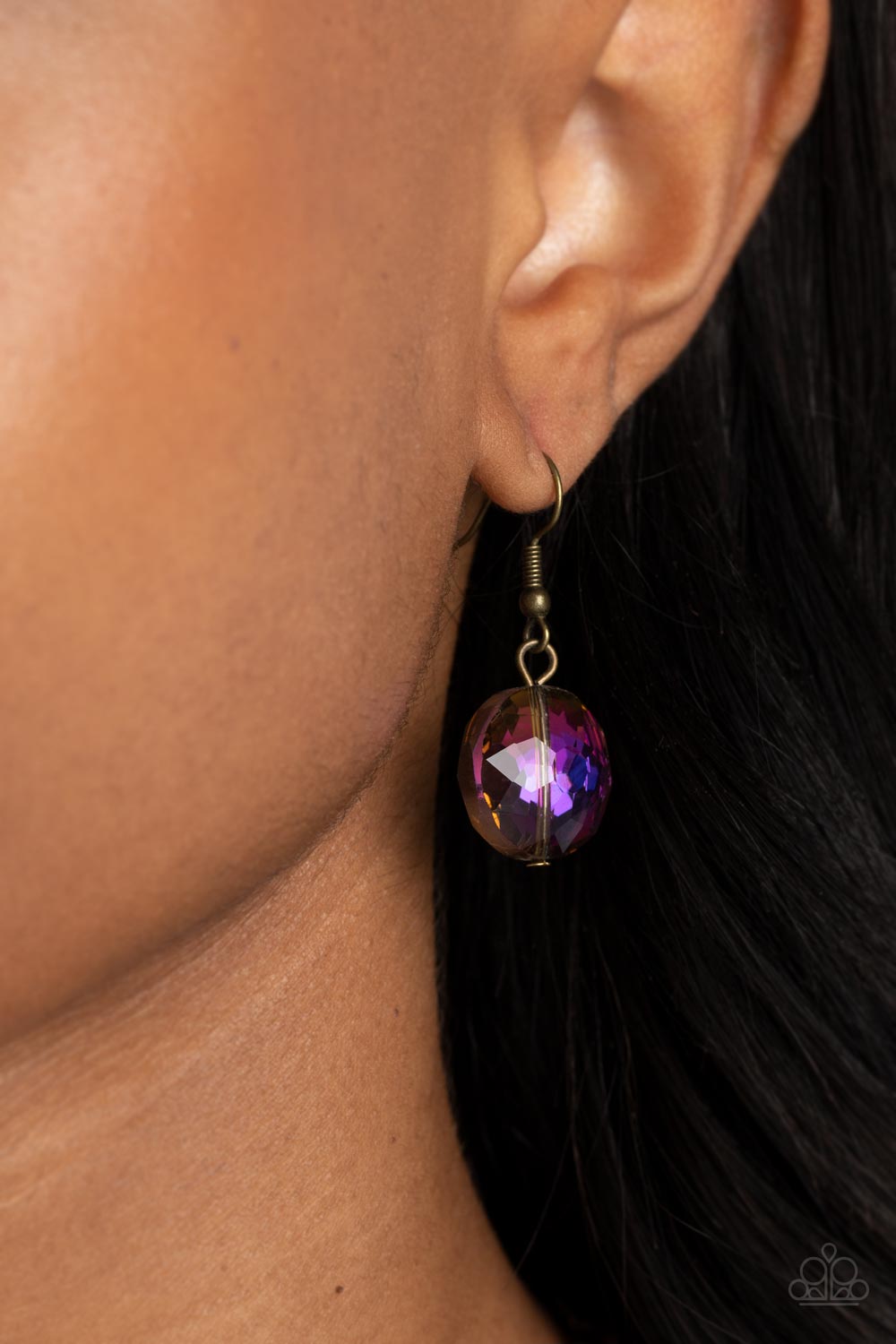 Paparazzi Accessories Celestially Celtic - Brass Thick links of brass twist into Celtic knot-like details, linking together with textured brass hoops along the collar. A pair of faceted, saucer-shaped crystal beads, dipped in a reflective oil spill coatin
