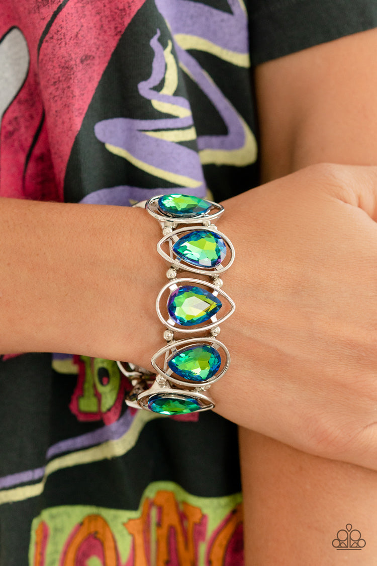 Paparazzi Accessories The Sparkle Society - Multi 1 Oversized teardrop gems, coated in a shimmery green refracted shimmer are seemingly suspended inside silver teardrop frames. The airy borders allow the faceted edges of the teardrop beads to take center