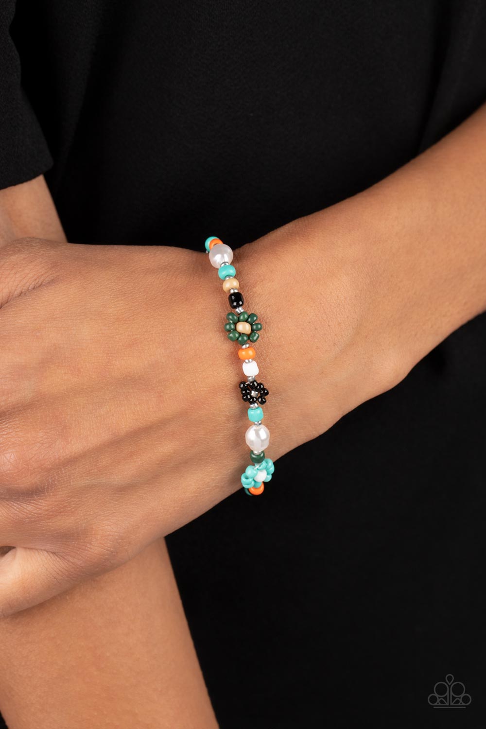 Paparazzi Accessories Groovy Gerberas - Blue Modeled after gerber daisies, multicolored seed beed petals in shades of Tiffany, orange, olive green, and black bloom around white, Iced Coffee, and silver beaded centers resulting in a dazzling collection of