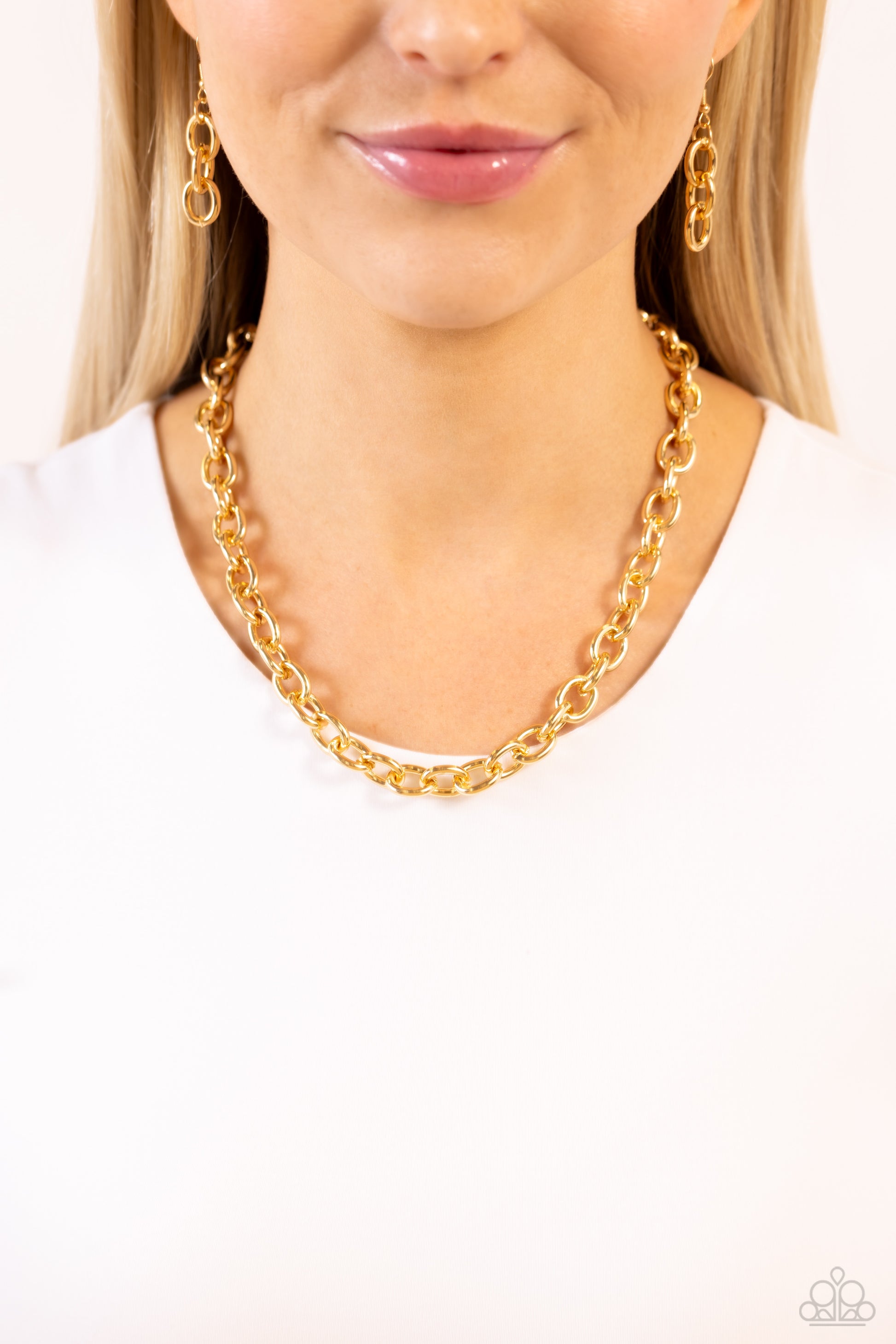 Paparazzi Accessories Things Have CHAIN-ged - Gold A strand of thick oversized gold chain links creates a bold, yet minimalistic statement piece as it wraps around the neck in an industrial-inspired finish. Features an adjustable clasp closure. Sold as on