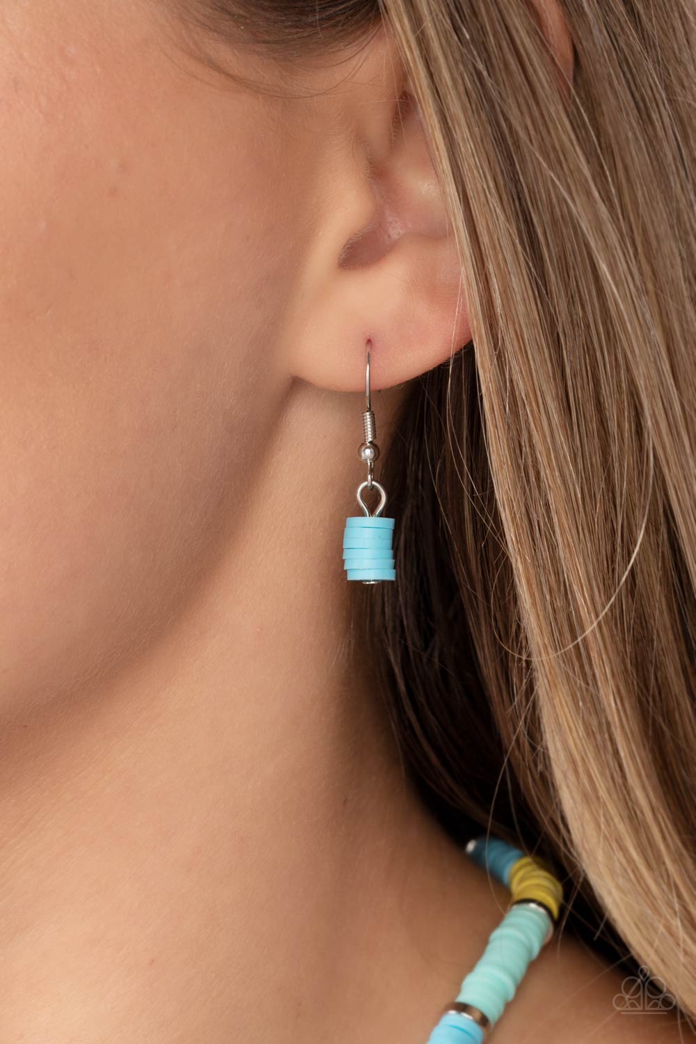 Paparazzi Accessories Rainbow Road - Blue Rubber discs in shades of Waterspout, Primrose, and turquoise are threaded along an invisible wire, adorning the collar in a courageous pop of color. Shiny silver discs separate the bands of color, adding a hint o