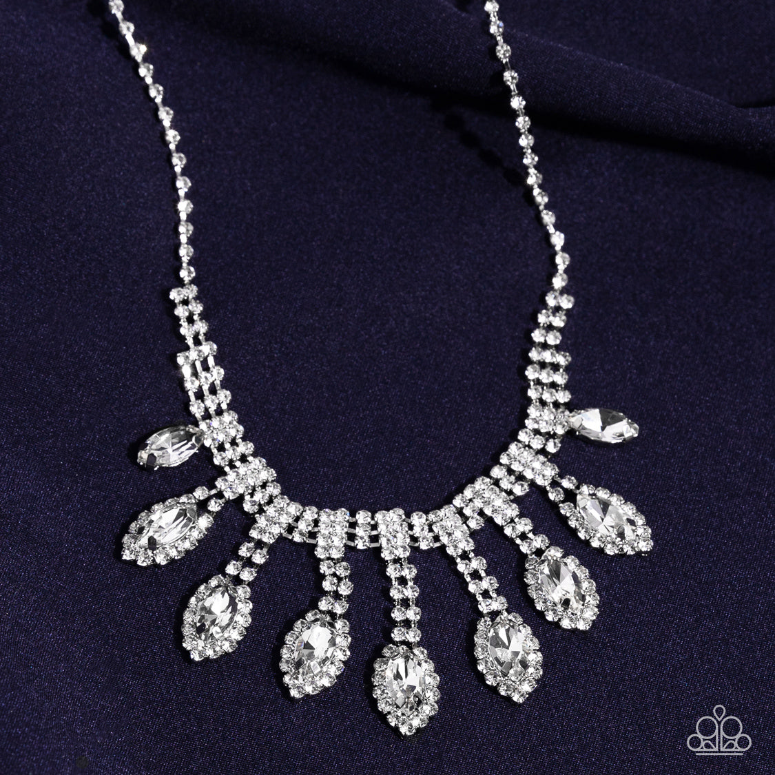 Paparazzi Accessories REIGNING Romance - White A classic silver chain leads down the neckline to a single strand of tiny rhinestones in dainty square fittings. A second row is added as the gems make their way to the centermost point of the design, where a