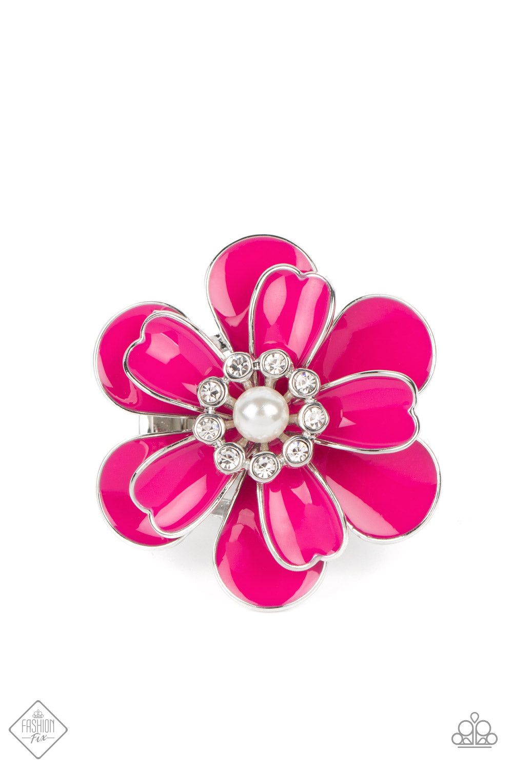 Paparazzi Accessories Budding Bliss - Pink An exaggerated pink flower with layers of petals blooms atop the finger in a vibrant display. A white pearl encircled by tiny white rhinestones adds a touch of whimsical sparkle to the design. Features a stretchy