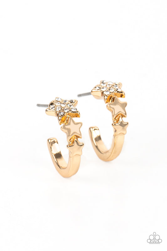 Paparazzi Accessories Starfish Showpiece - Gold A shiny gold bar curls around the ear into a dainty hoop. Three gold stars gradually increase in size as they climb the curve of the hoop, with the biggest star emblazoned with white crystal-like rhinestones