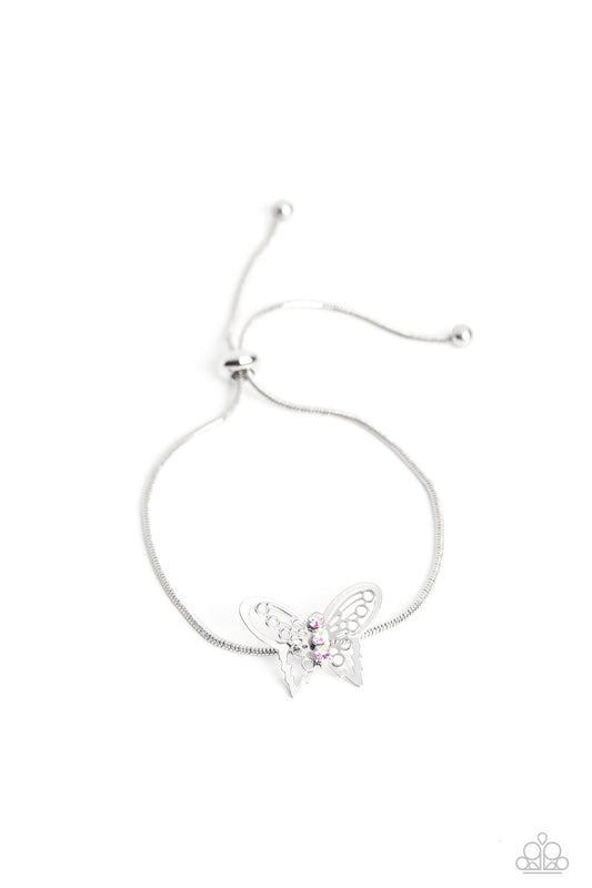Paparazzi Accessories Wings of Wonder - Multi A deceptively simple silver butterfly charm glides along a silver snake chain for a whimsical flair along the wrist. Dainty, iridescent rhinestones encrust along the butterfly's body, creating an understated s