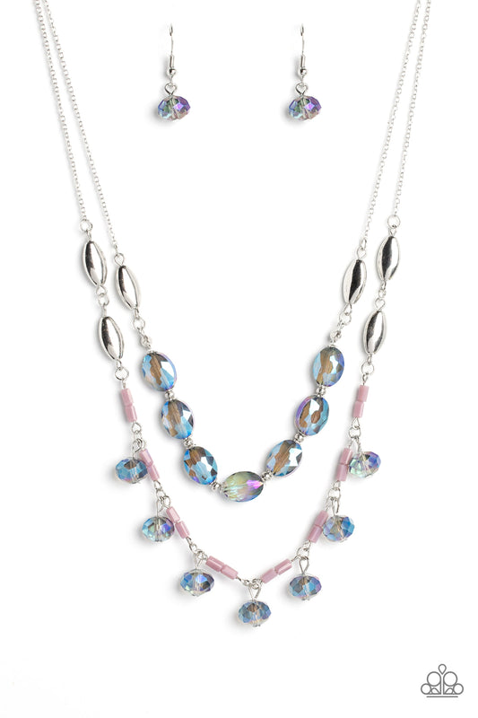 Paparazzi Accessories Sheen Season - Blue Two strands of dainty silver chain are adorned in a collection of mauve opaque beads, faceted glassy blue beads, and silver accents, culminating in a layered design rich with vintage character. The glassy beads th
