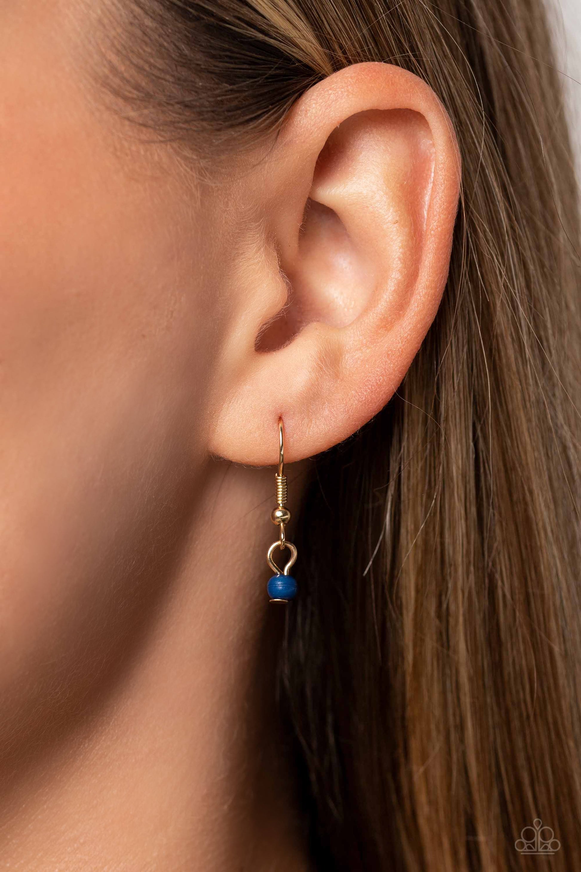 Paparazzi Accessories High School Reunion - Blue Gliding from a dainty, gold chain, a smiley face pendant stands out against a white backdrop. Completing the charismatic ensemble, a collection of seed beads in shades of Spun Sugar, baby pink, navy blue, w